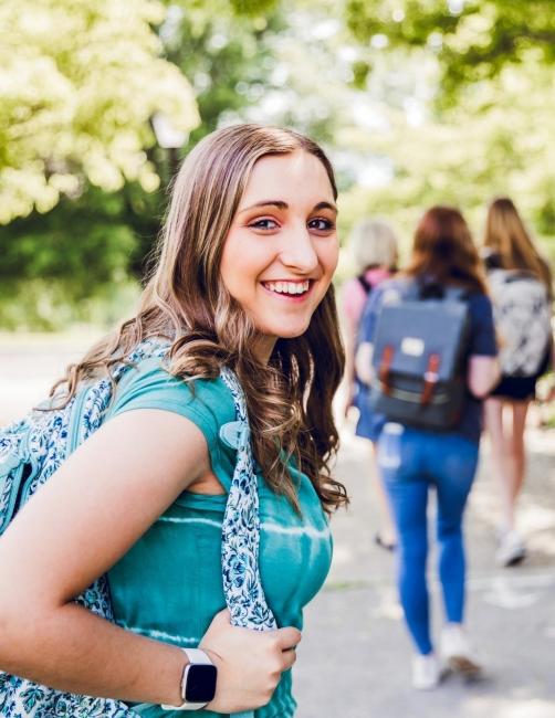 Female student wearing backpack